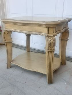 Light Wood Table With Decorative Curved Legs