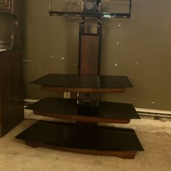 Three tier glass television stand