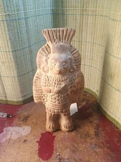 "Bird God" figurine. Folk art made in Mexico