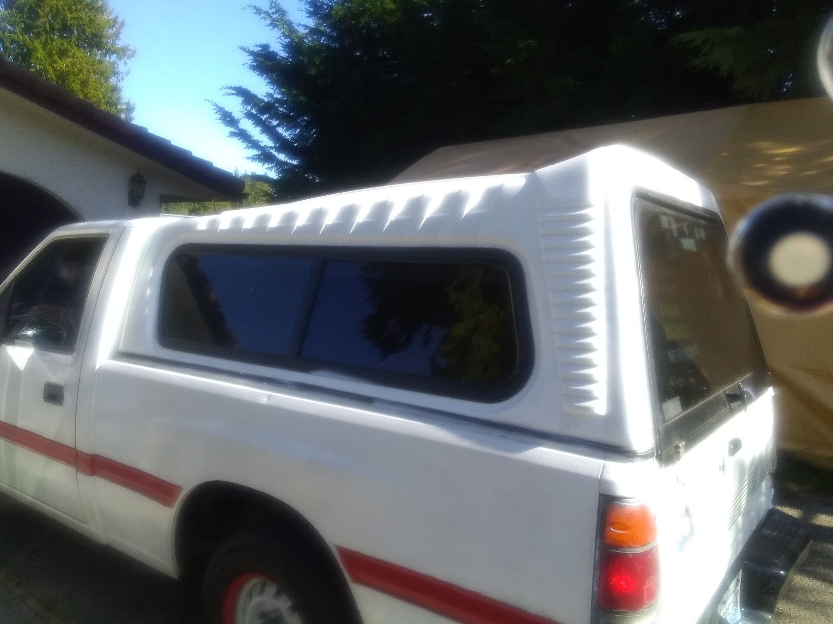 5'x75" extra tall camper shell. On a 1991 isuzu right now