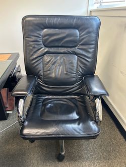 Italian leather Executive desk chair on castors chair .  R