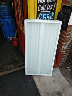 Fluorescent overhead lighting.. Needs new home.