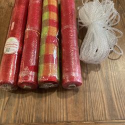 4 Rolls Of Unused Mess And 1 Roll Of Tubing