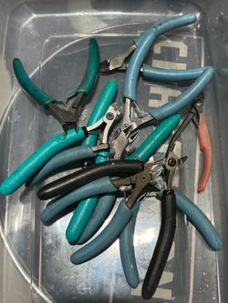 Professional-grade precision tool lot includes various wire cutters and pliers. This set features Swanstrom 411 and Excelta 7140E models made in the U