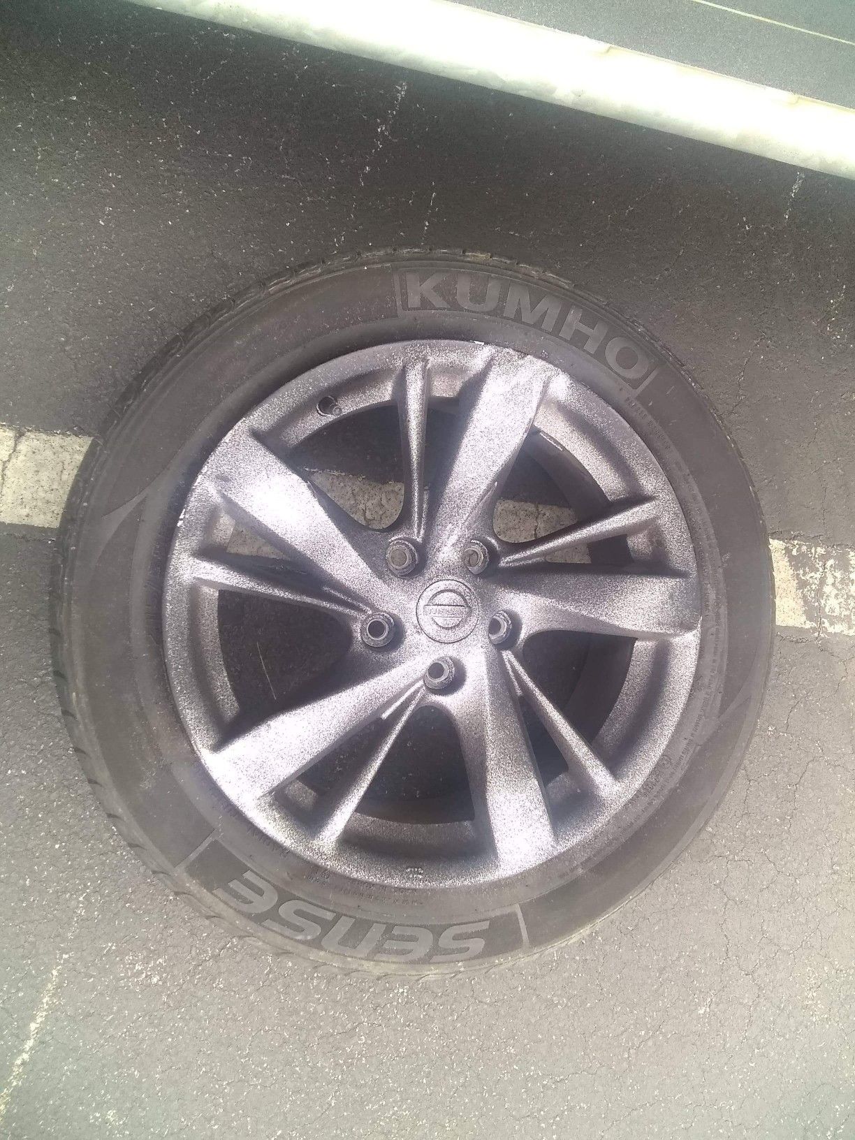 All four 215/55/R17 khumo tires factory nissan rims