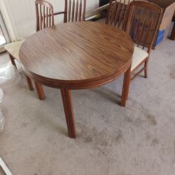 Free Piano, Sewing Machine, Dining Table And Chairs, And Small Rolling Cabinets.