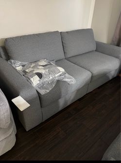 Ashley large sectional never  been used￼ brand new out of the box. I have a three-piece and the two-piece in gray.