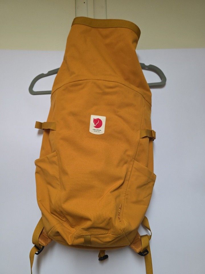 Fjallraven Uivo, Rolltop backpack daypack, waterproof laptop sleeve, orange, 30 L.