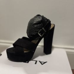 Black suede strap prep toe heels