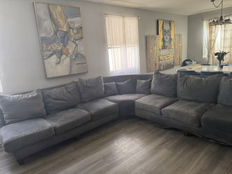 Beautiful gray sectional needs TLC