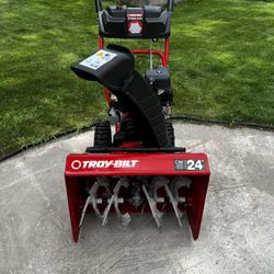 Troy-Built Storm 24 in. 208 cc Two- Stage Gas Snow Blower with Electric Start Self Propelled  