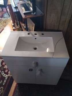 New Bathroom Vanity  With A Cracked Sink 