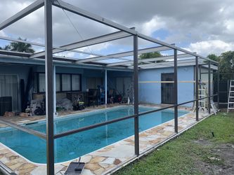 Pool enclosure screen and kick plate