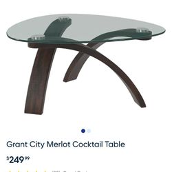 Rooms Togo Glass top cocktail table charcoal