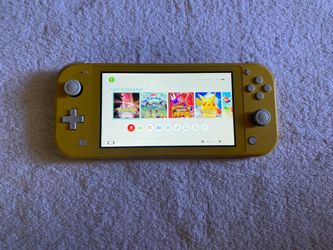 NINTENDO SWITCH LITE with 7500 GAMES