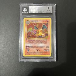 1999 Pokemon Base 1st Edition Thick Stamp #4 Charizard Holo 4 102 BGS 8 NM