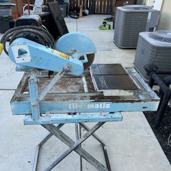 Heavy duty tile saw with blade and stand $100.00