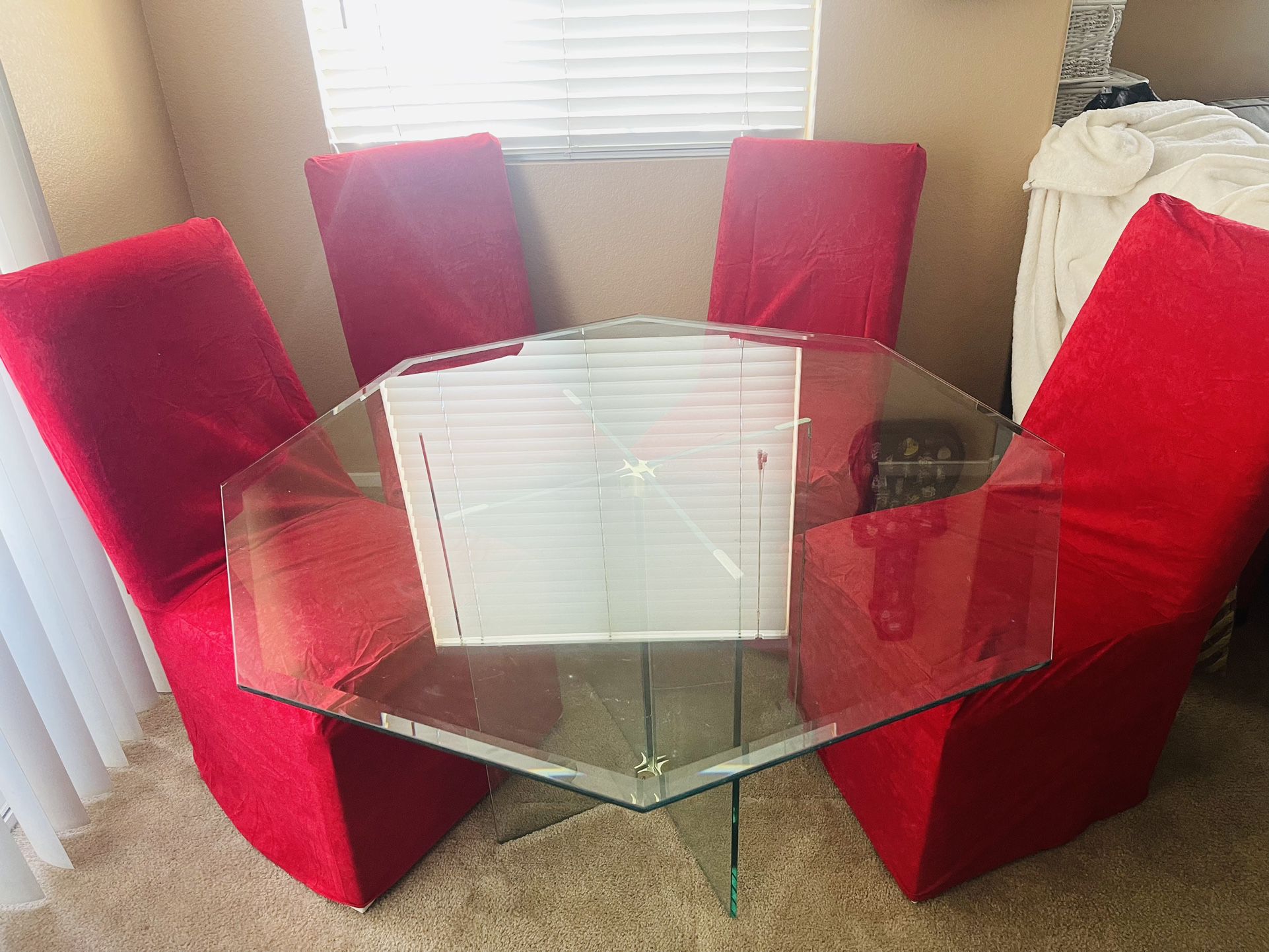 Glass Table & 4 Chairs With Red And Tan Chair Covers