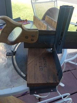 Miter box with saw an angle