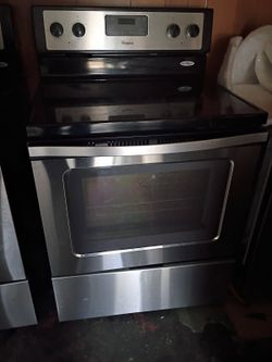 NEW HIGH END STAINLESS STEEL AND BLACK ELECTRIC SMOOTH TOP STOVE 