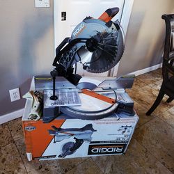 Ridgid 15 Amp Corded 12 in. Dual Bevel Miter Saw with LED Cutline Indicator.