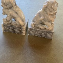Vintage pair of hand-carved Chinese Foo Dog sculptures, made of soapstone. 