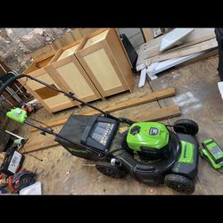 LOW PRICE MOVING- Green works Electric $550 + TAX RETAIL LAWN MOWER 