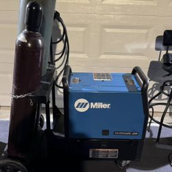 Miller Multimatic 255 multiprocess welding Machine  dual cylinder/ running gear & tig kit