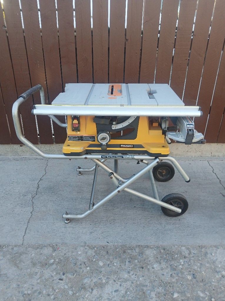 RIDGID TABLE SAW WITH ROLLING STAND $225