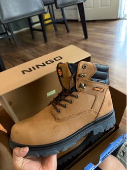 Ningo work boots 11.5us , waterproof and steel toe. Never worn, recieved the wrong size.