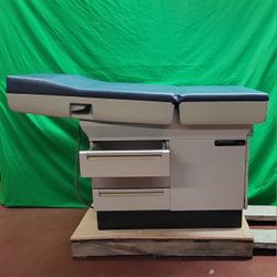 Midmark 404 Examination Table  GYN Table With Stirrups