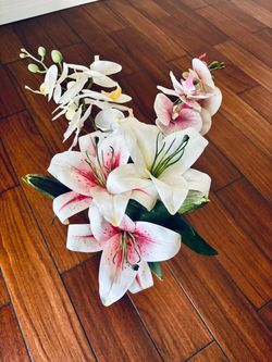 Faux lilies and orchid vase