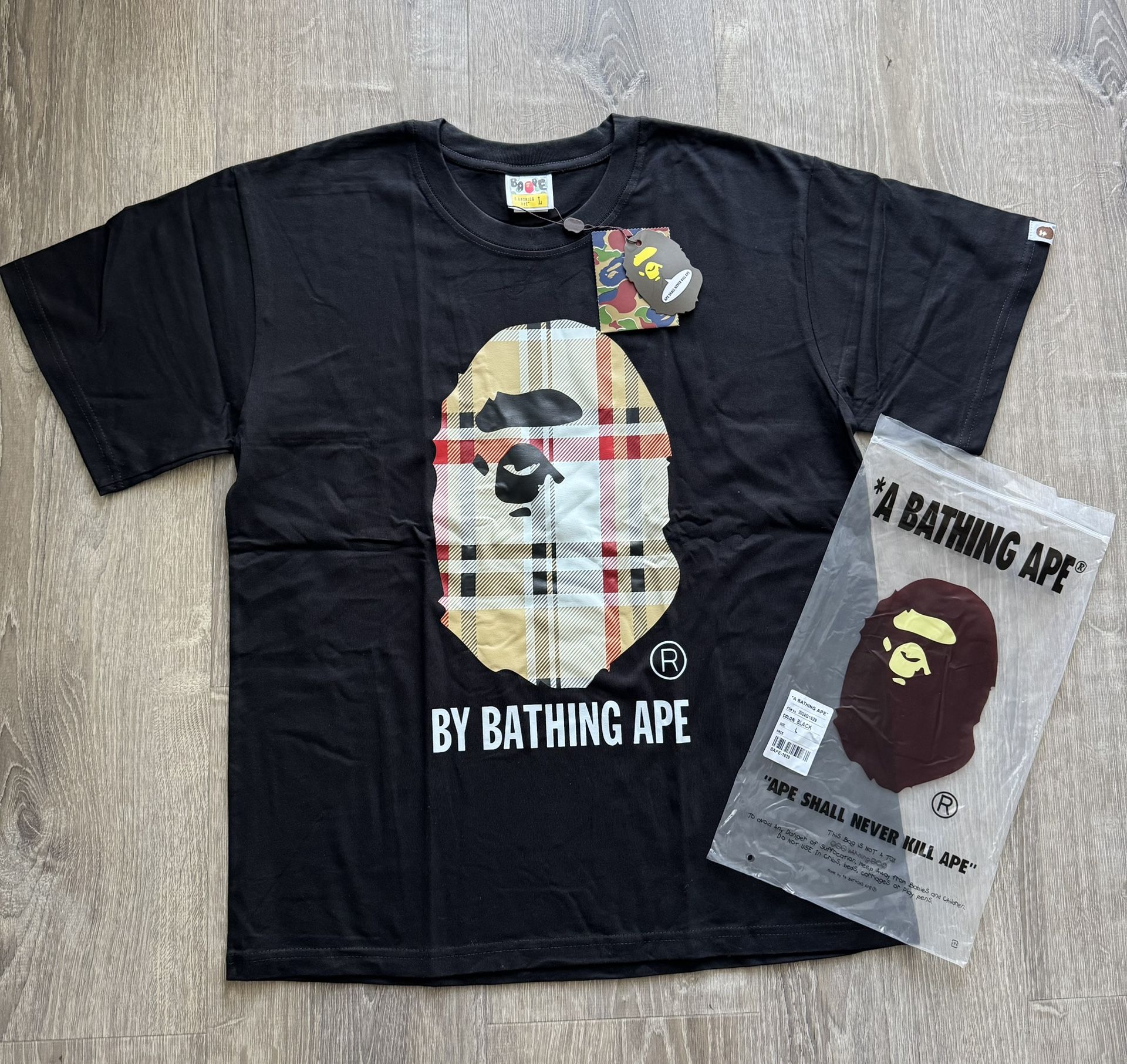 Like new Bape Burberry Tee Sizes M/L