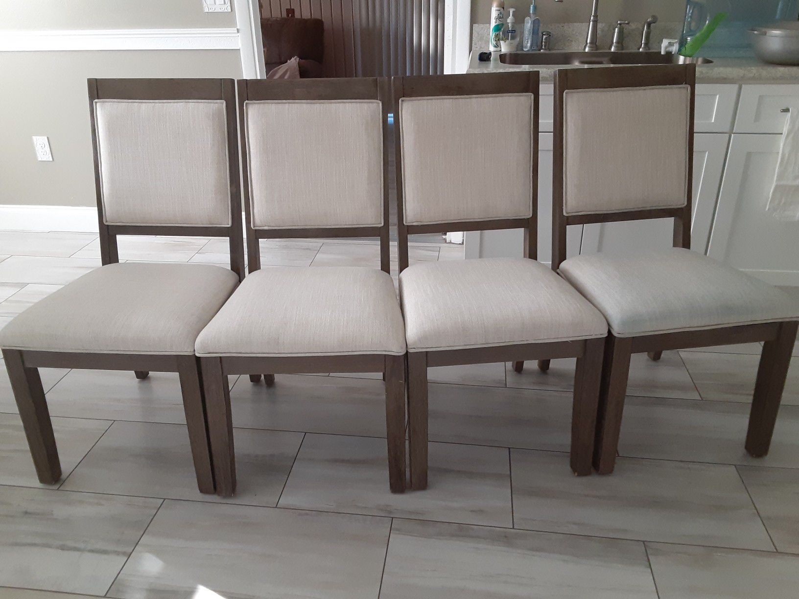 4 wood and material chairs
