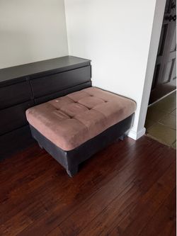 Brown and black ottoman