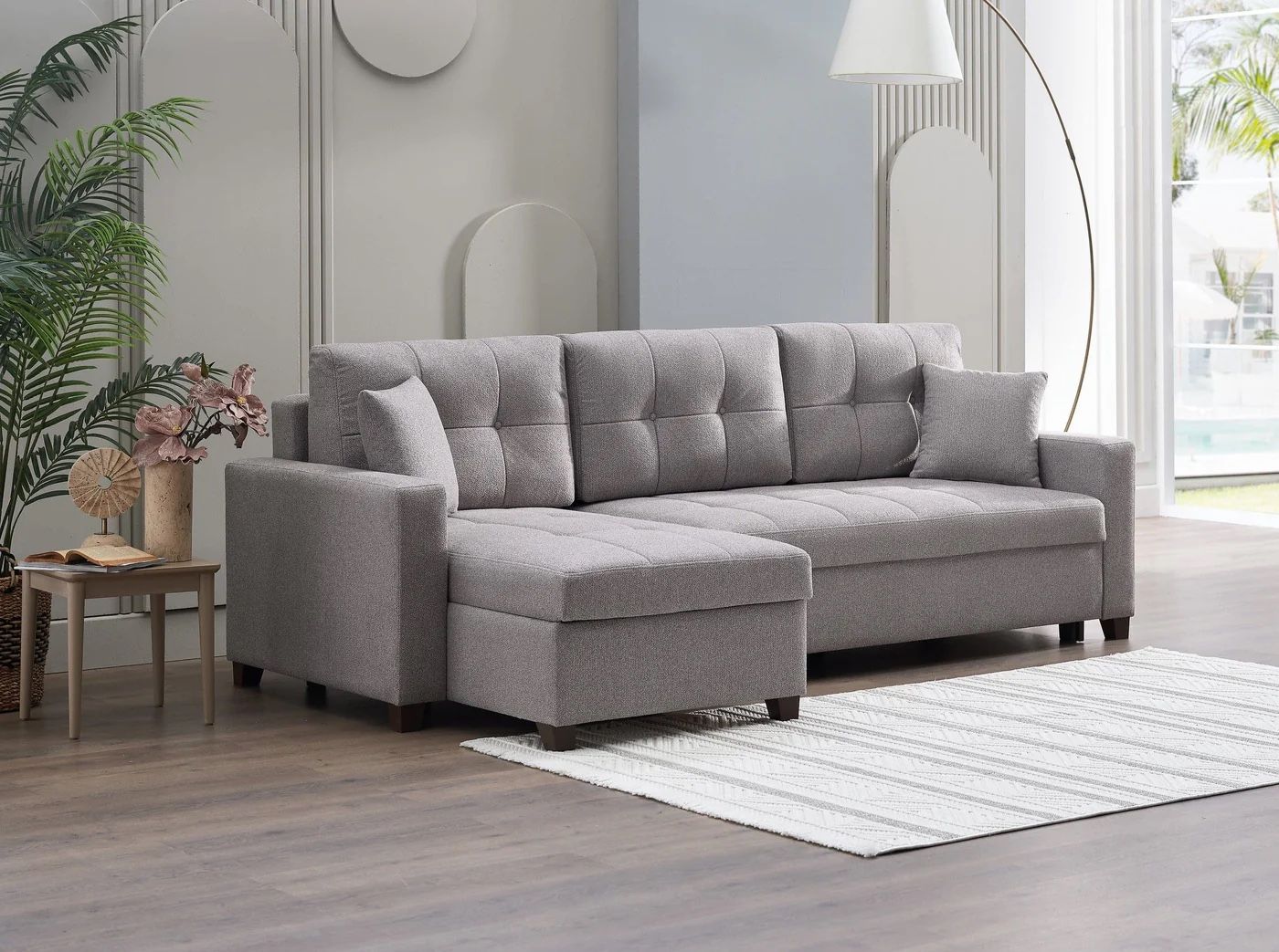 Mocca reversible chaise sleeper sectional. $53 down Payment