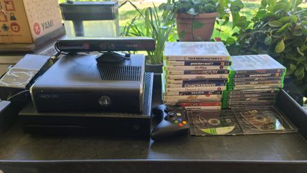 Lot of 2 Xbox Consoles with games