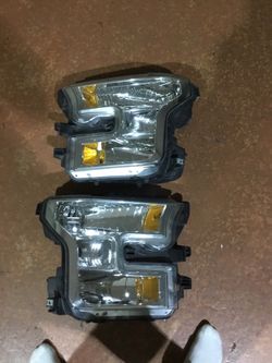 2016 Ford F150 XLT left and right OEM headlights