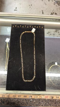Two tone figaro chain 14k 19.2 grams 22in
