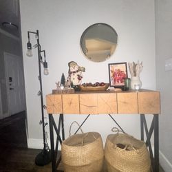 Entryway table set with mirror and lamp in industrial style.