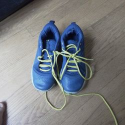 Underarmor  These are a pair of Under Armour Curry One basketball shoes. The blue and yellow colorway is associated with Stephen Curry and the Golden 