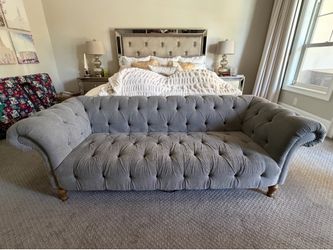 Gray chesterfield tufted sofa