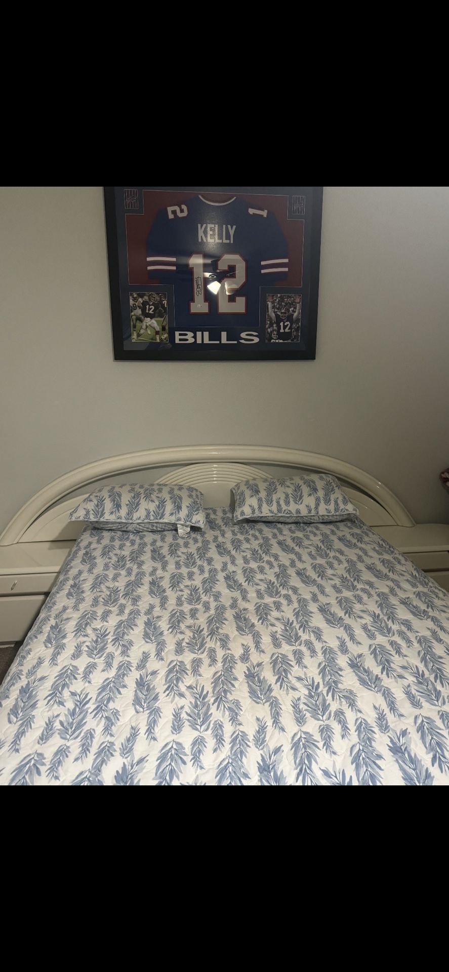 cream bed frame and dresser