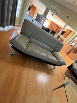 Gray Leather Loveseat with Chrome Base