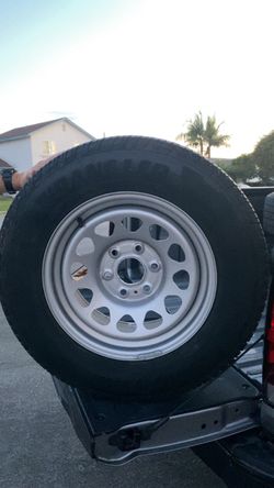 Tire and Silver Steel Wheel