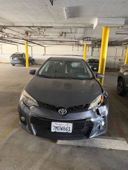 2015 Toyota Corolla Sedan with Front-End Damage