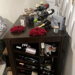 Counter height dining room table with wine rack