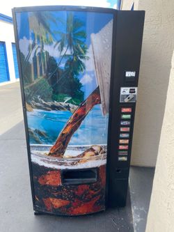 Soda pop vending machine