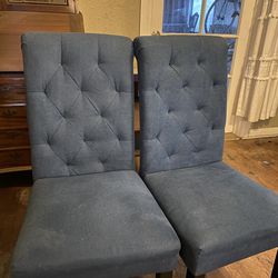 Two almost brand new blue dning chairs