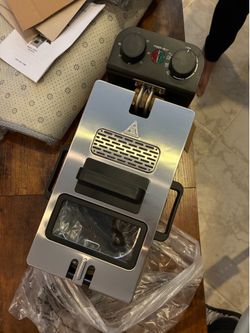 Brand new deep  fryer with basket